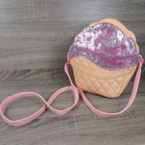 Iron fist Glitter pink shimmering frosting cupcake purse. defects